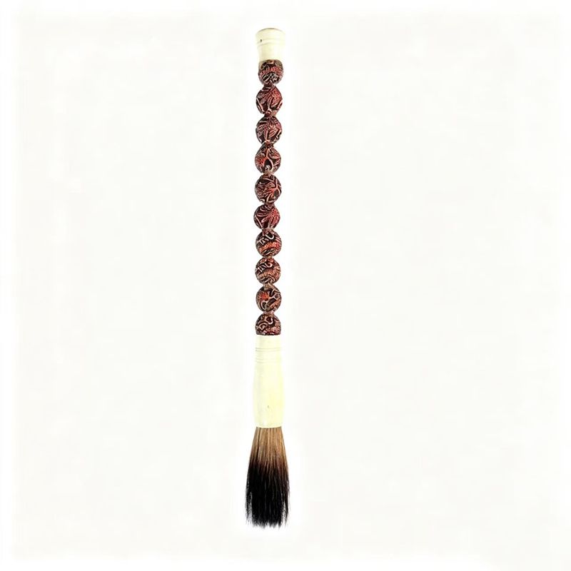long slim carved calligraphy brush